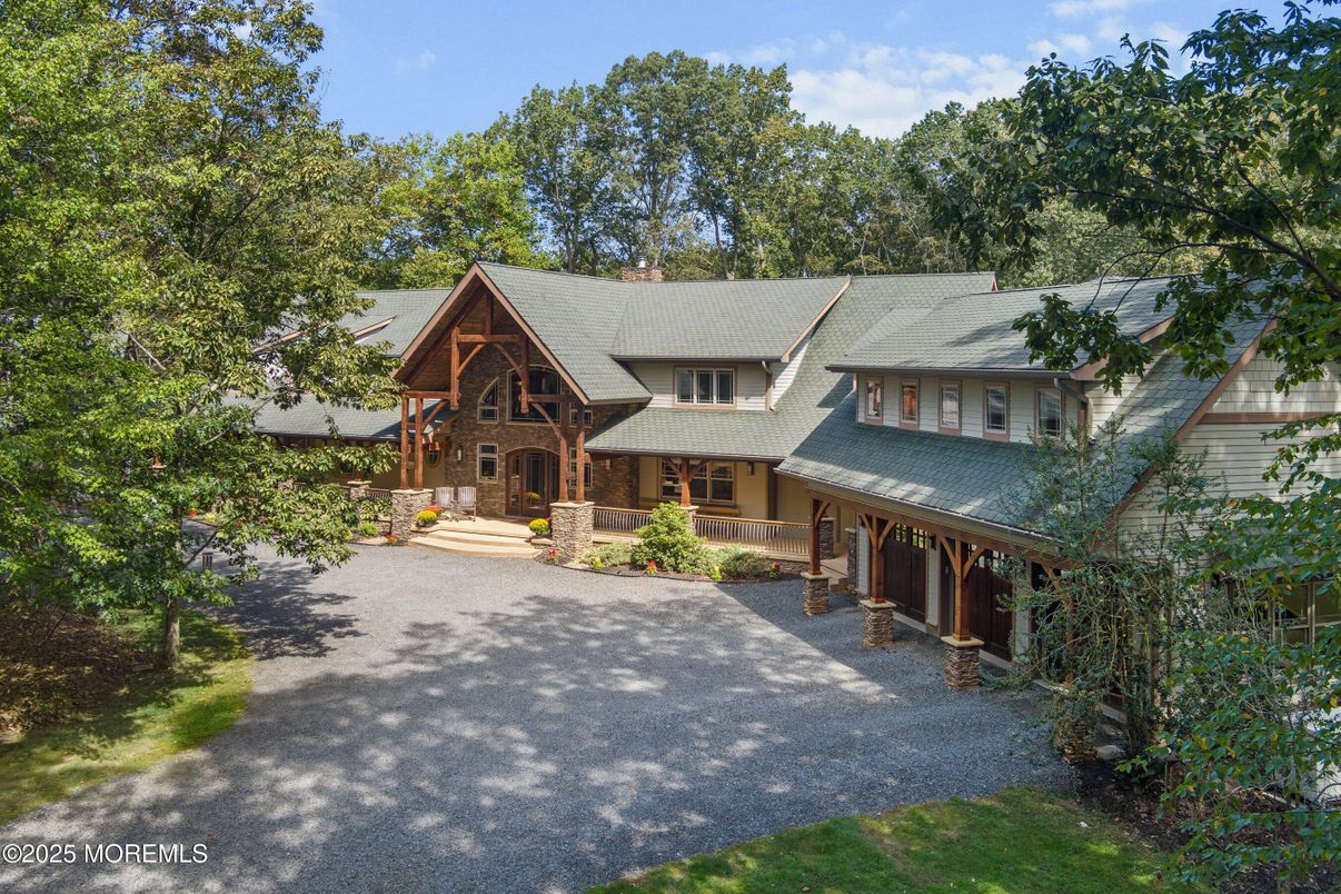 Exterior, Facade, Solar Panels, Log Home