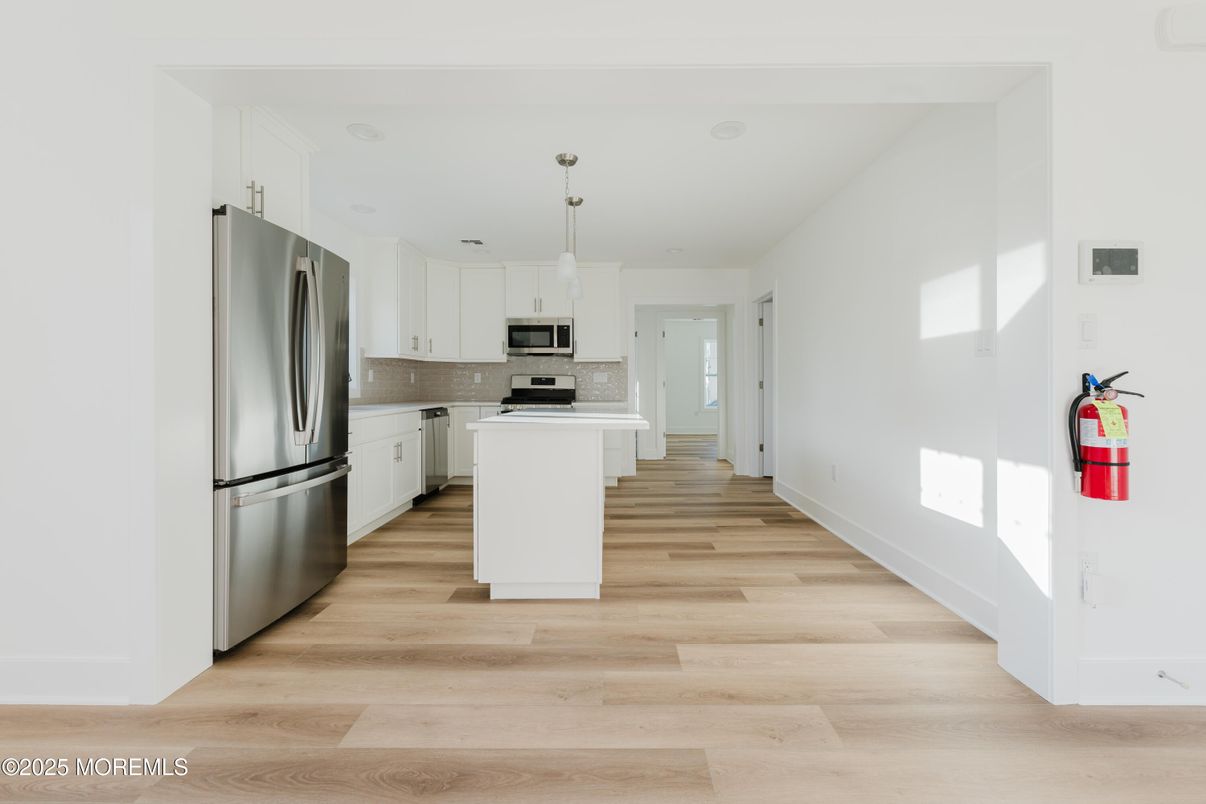 Interior, Kitchen, Pendant Lights, Stainless Steel Appliances, Wood Texture Flooring