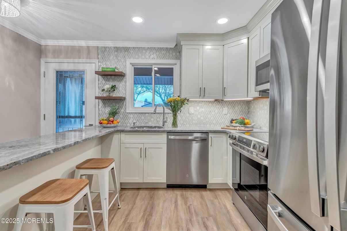 Interior, Kitchen, Recessed Lighting, Stainless Steel Appliances, Wood Texture Flooring