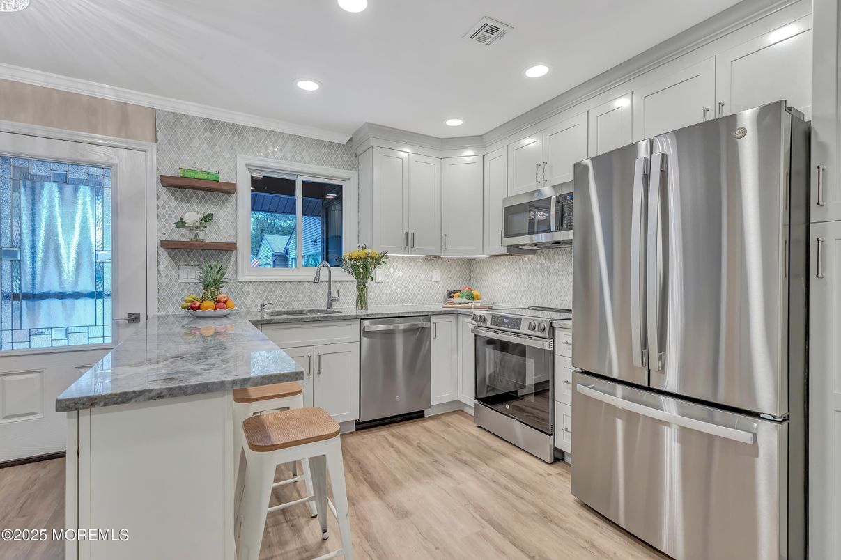 Interior, Kitchen, Recessed Lighting, Stainless Steel Appliances, Wood Texture Flooring