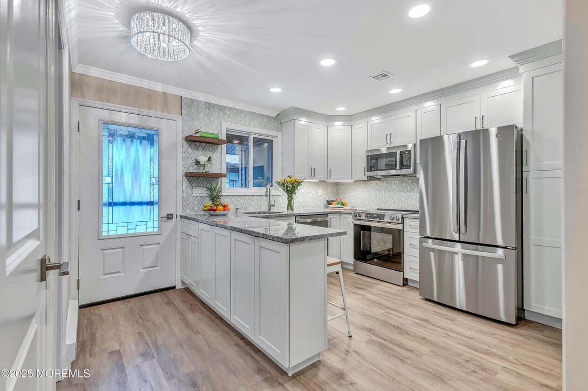 Interior, Kitchen, Recessed Lighting, Stainless Steel Appliances, Wood Texture Flooring