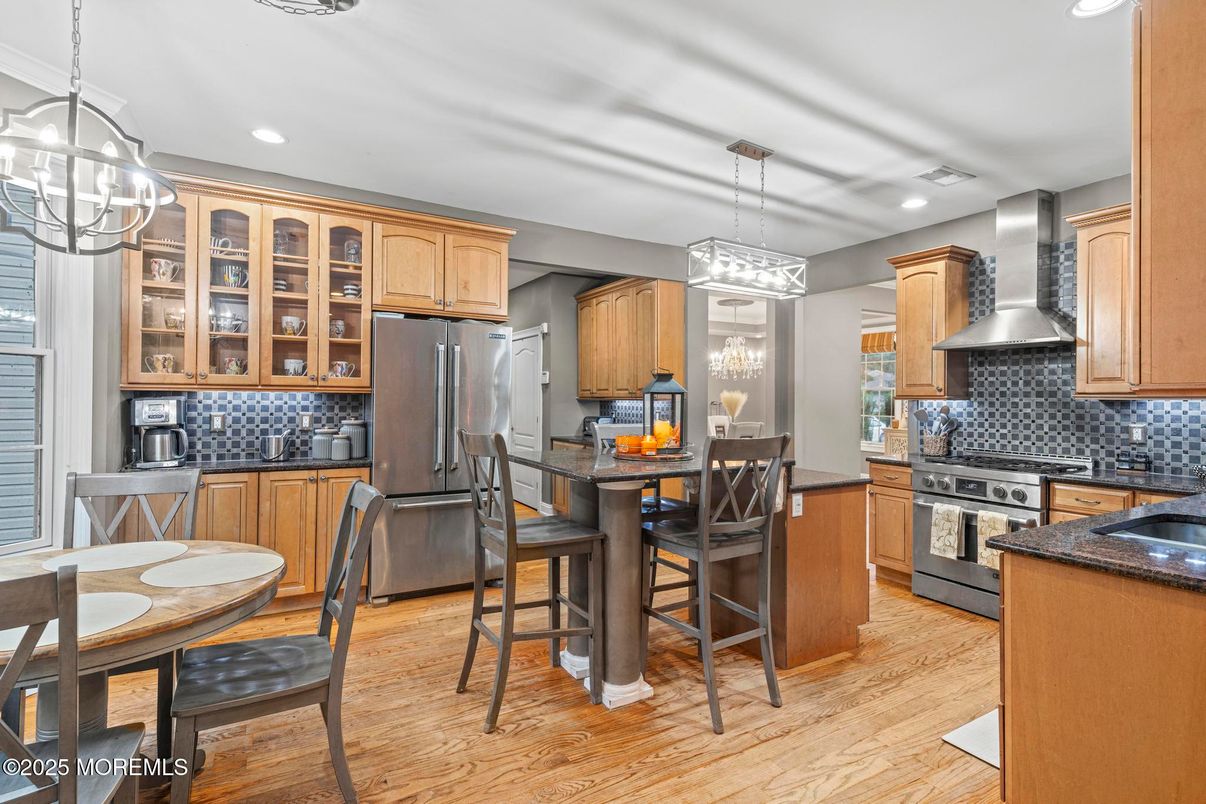 Dining room, Interior, Kitchen, Pendant Lights, Recessed Lighting, Stainless Steel Appliances, Wood Texture Flooring