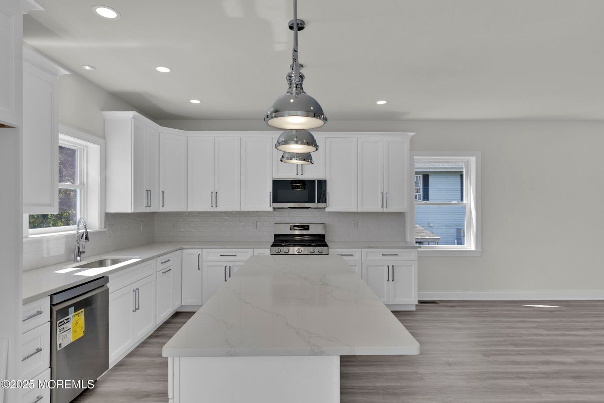 Interior, Kitchen, Pendant Lights, Recessed Lighting, Stainless Steel Appliances, Wood Texture Flooring