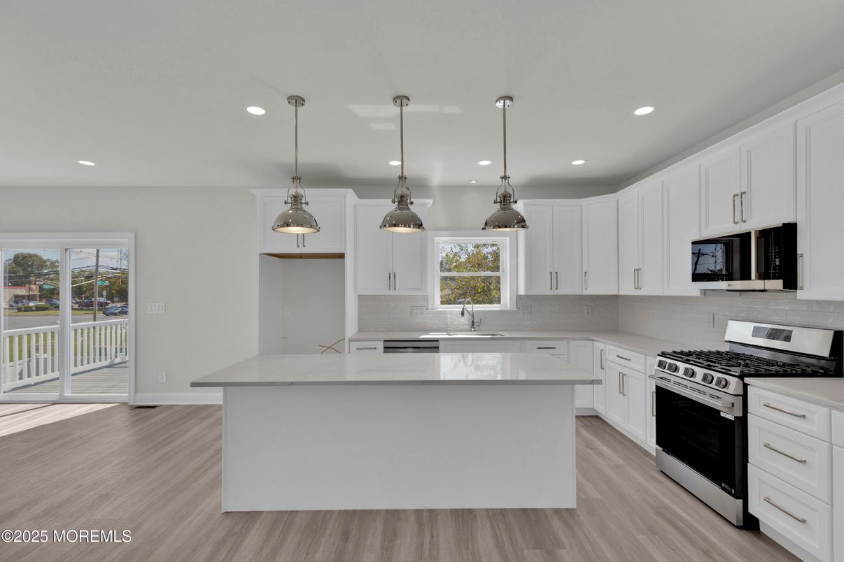 Interior, Kitchen, Pendant Lights, Recessed Lighting, Stainless Steel Appliances, Wood Texture Flooring