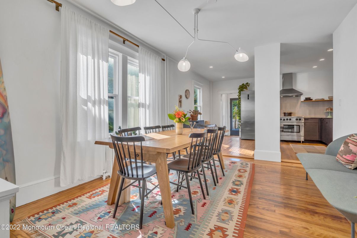 Dining room, Interior, Kitchen, Pendant Lights, Recessed Lighting, Stainless Steel Appliances, Wood Texture Flooring