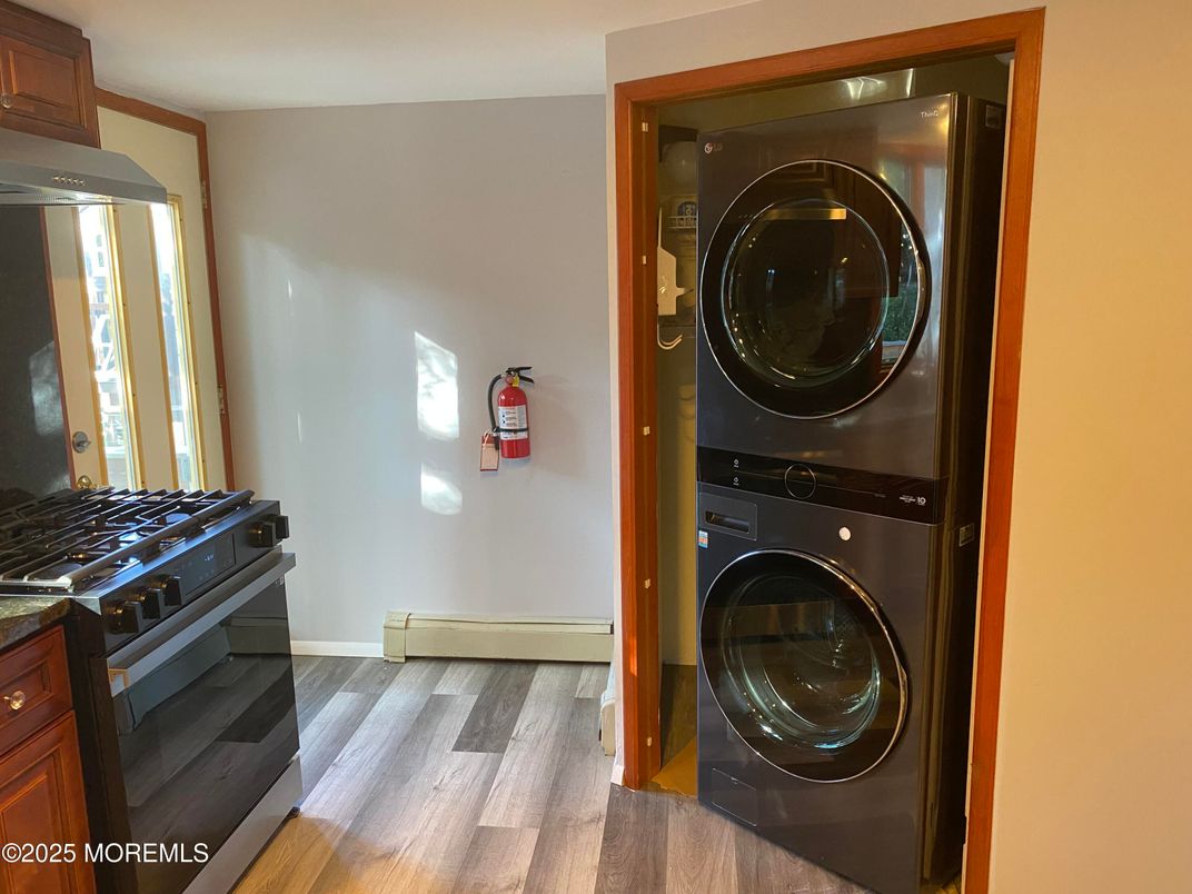 Interior, Kitchen, Utility Closets, Washer, Wood Texture Flooring