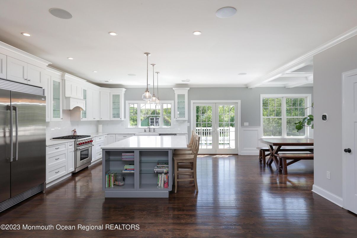 Dining room, Interior, Kitchen, Pendant Lights, Recessed Lighting, Stainless Steel Appliances, Wood Texture Flooring