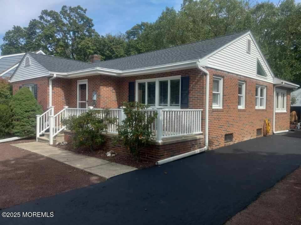 Exterior, Facade, Brick Facade, Cape Cod