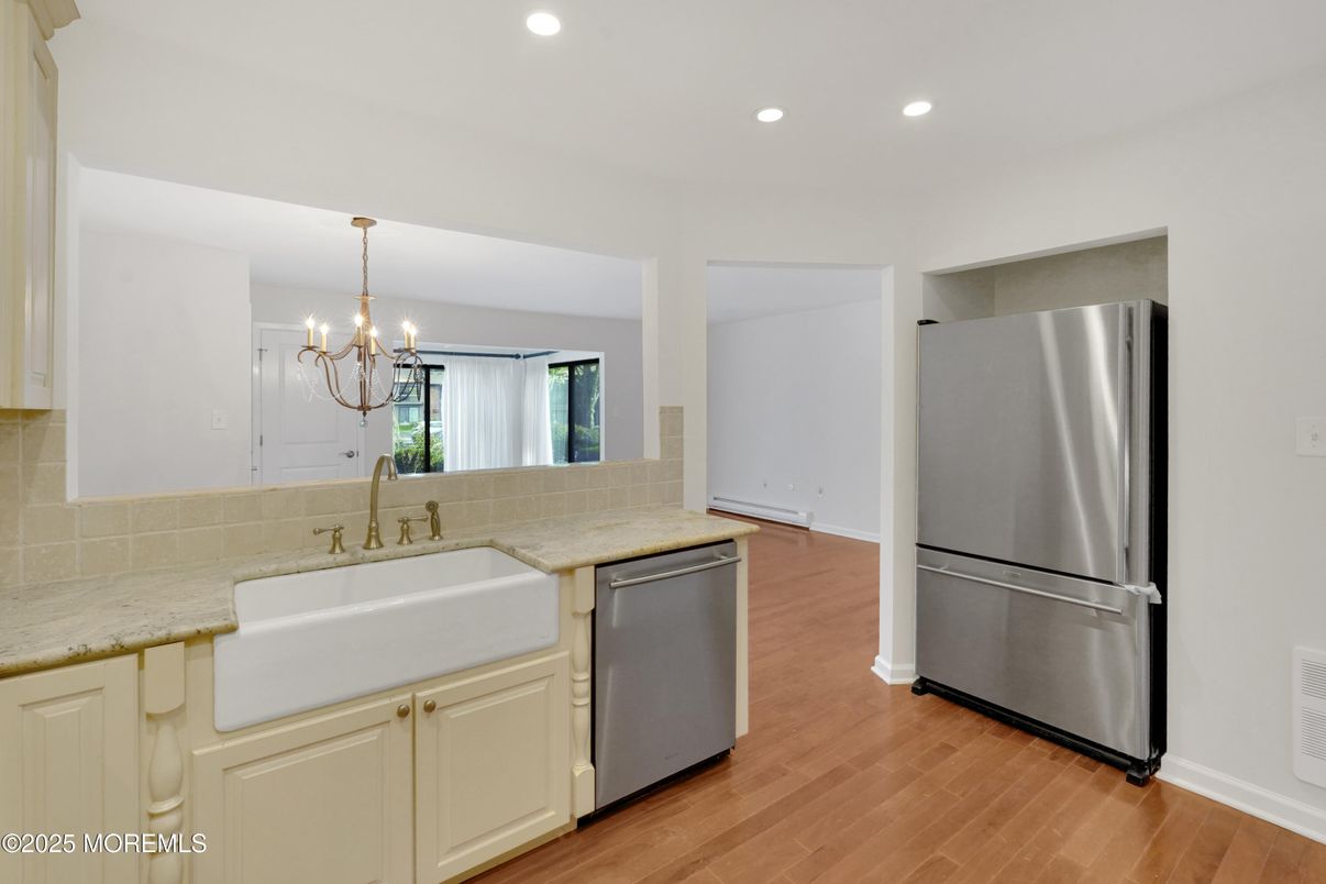 Chandelier, Interior, Kitchen, Recessed Lighting, Stainless Steel Appliances, Wood Texture Flooring