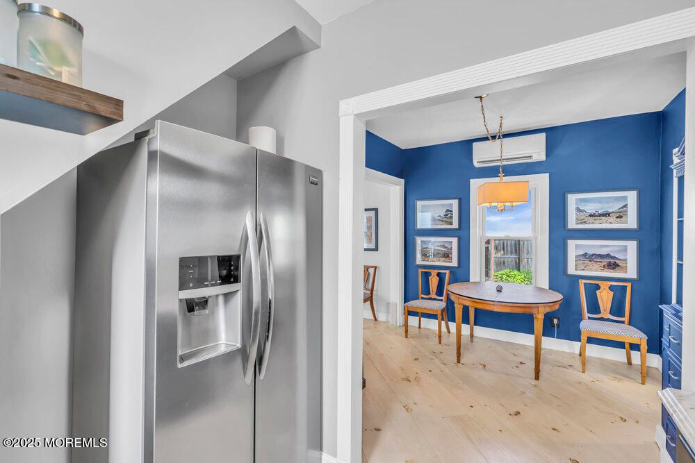 Dining room, Interior, Kitchen, Pendant Lights, Stainless Steel Appliances, Wood Texture Flooring