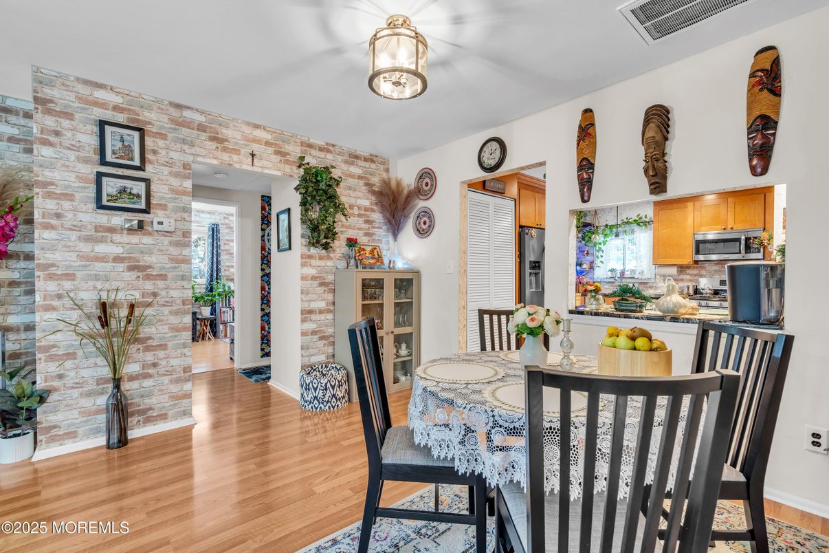 Dining room, Interior, Kitchen, Stainless Steel Appliances, Stone Walls, Wood Texture Flooring