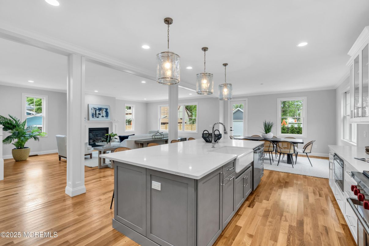 Dining room, Fireplace, Interior, Kitchen, Pendant Lights, Recessed Lighting, Wood Texture Flooring