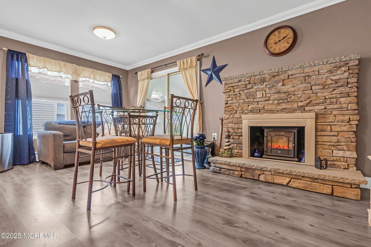 Dining room, Fireplace, Interior, Stone Walls, Wood Texture Flooring