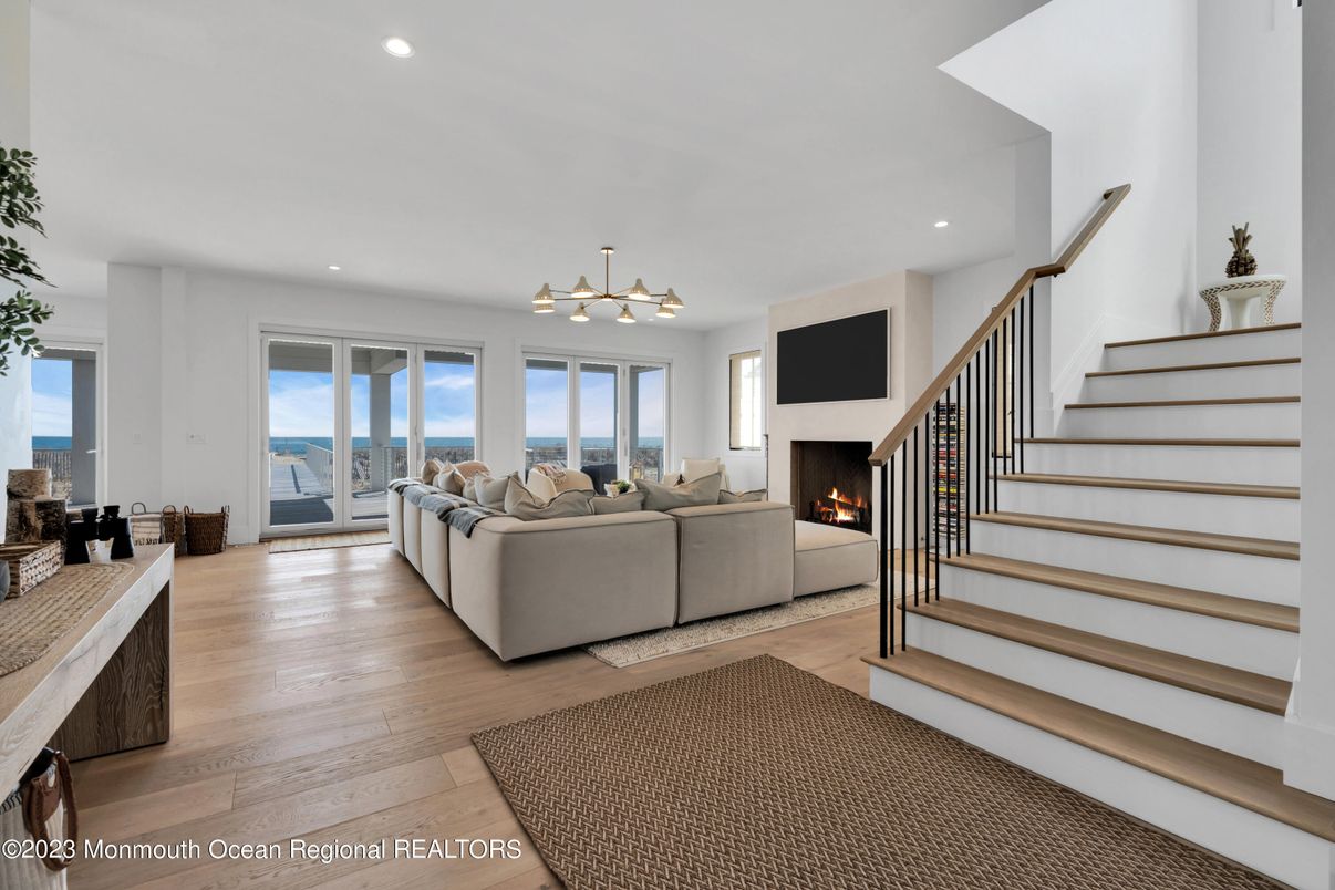 Fireplace, Interior, Living room, Recessed Lighting, Water, Wood Texture Flooring