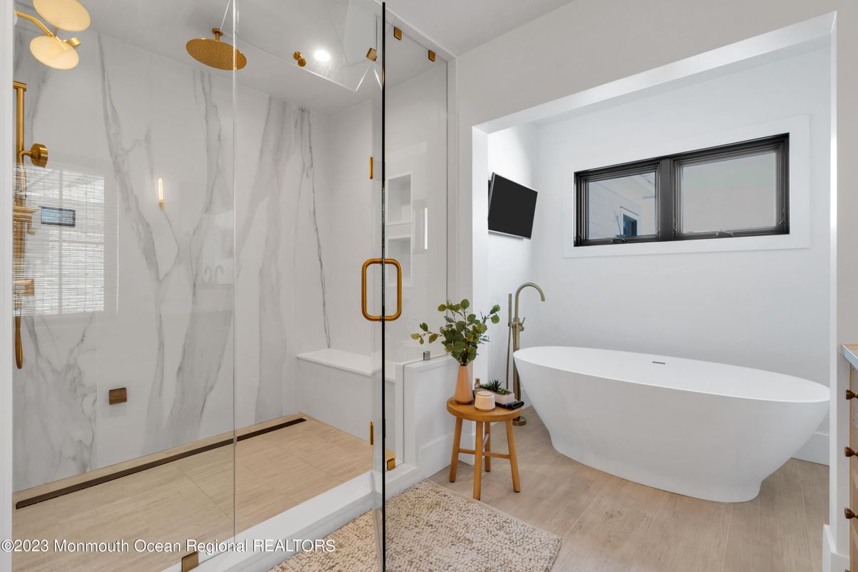 Bathroom, Free Standing Baths, Glass Shower, Interior, Marble Walls, Recessed Lighting