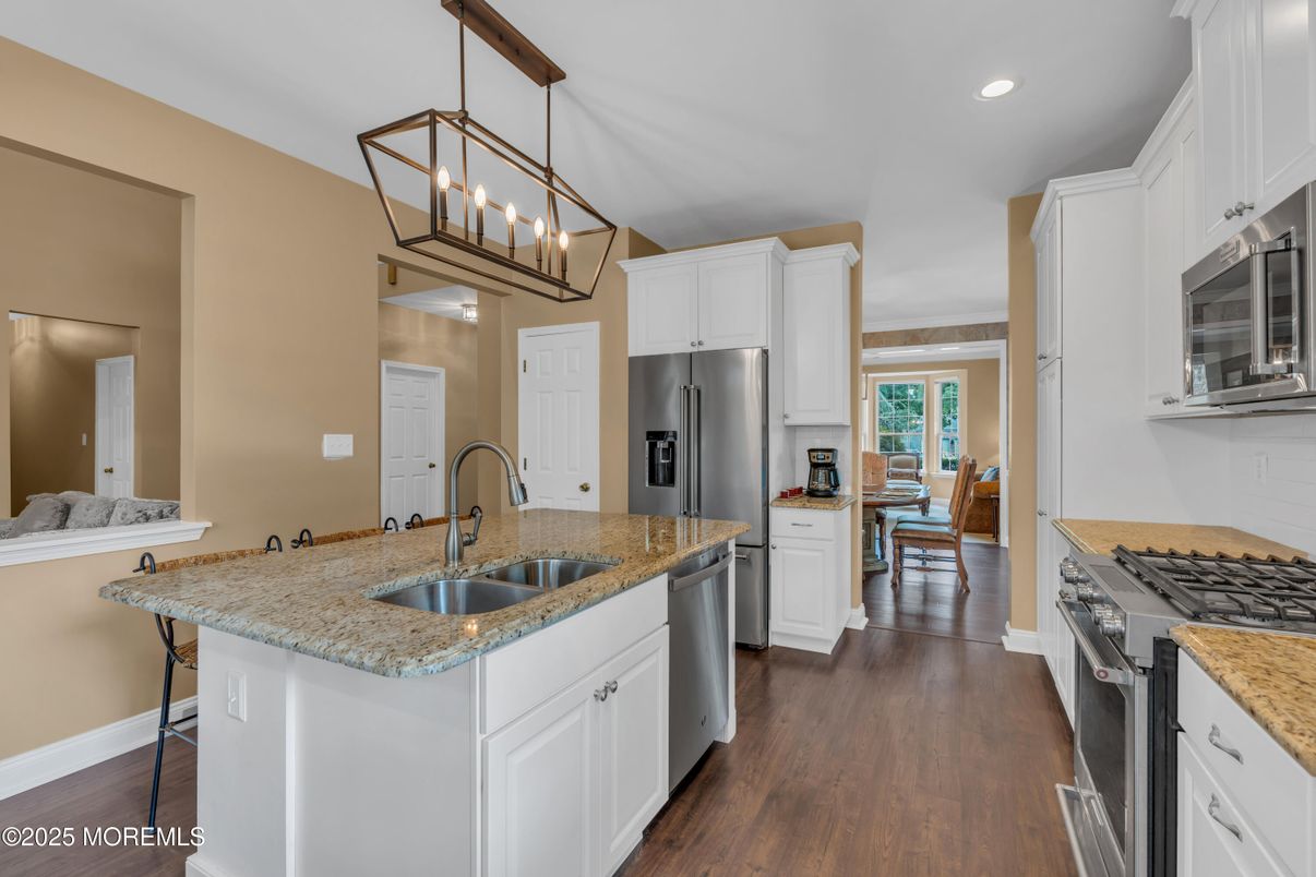 Chandelier, Interior, Kitchen, Pendant Lights, Recessed Lighting, Stainless Steel Appliances, Wood Texture Flooring