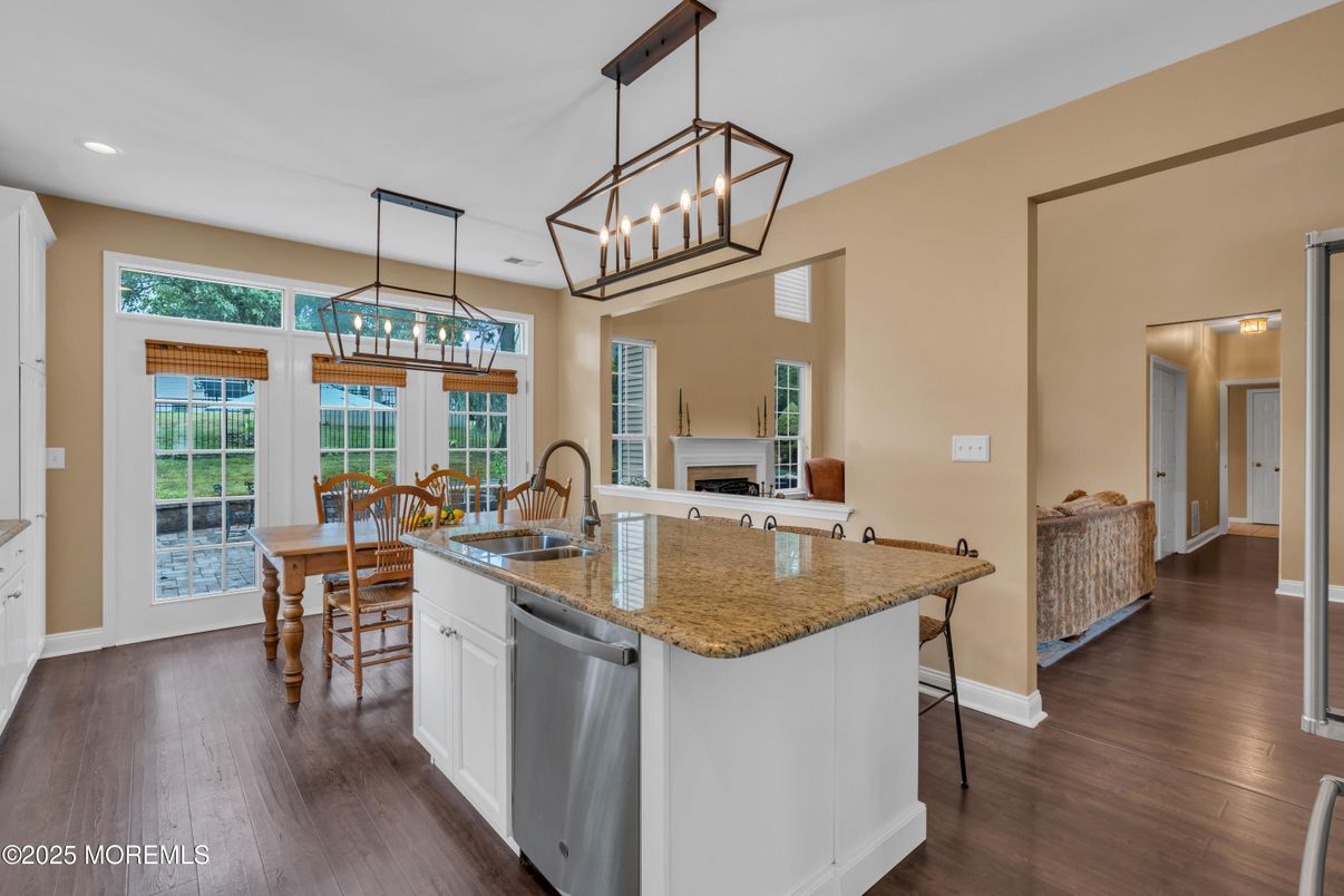 Dining room, Fireplace, Interior, Kitchen, Pendant Lights, Recessed Lighting, Wood Texture Flooring