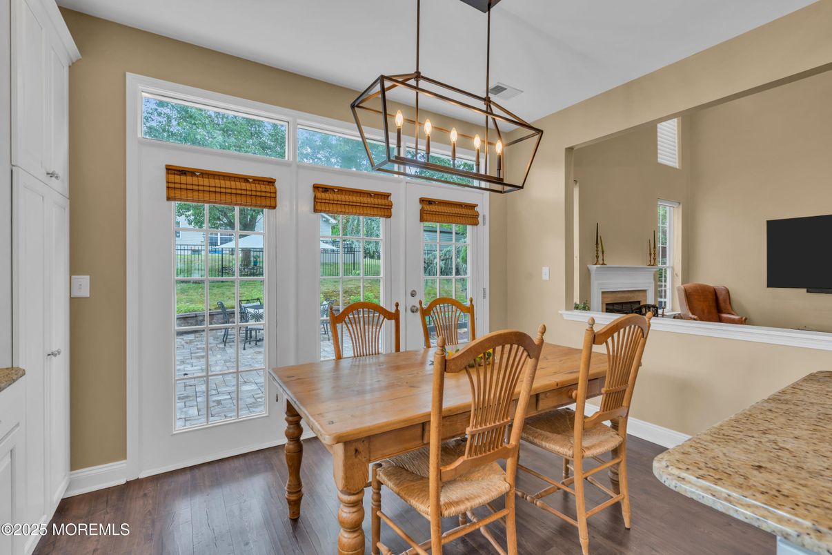 Dining room, Fireplace, Interior, Pendant Lights, Wood Texture Flooring