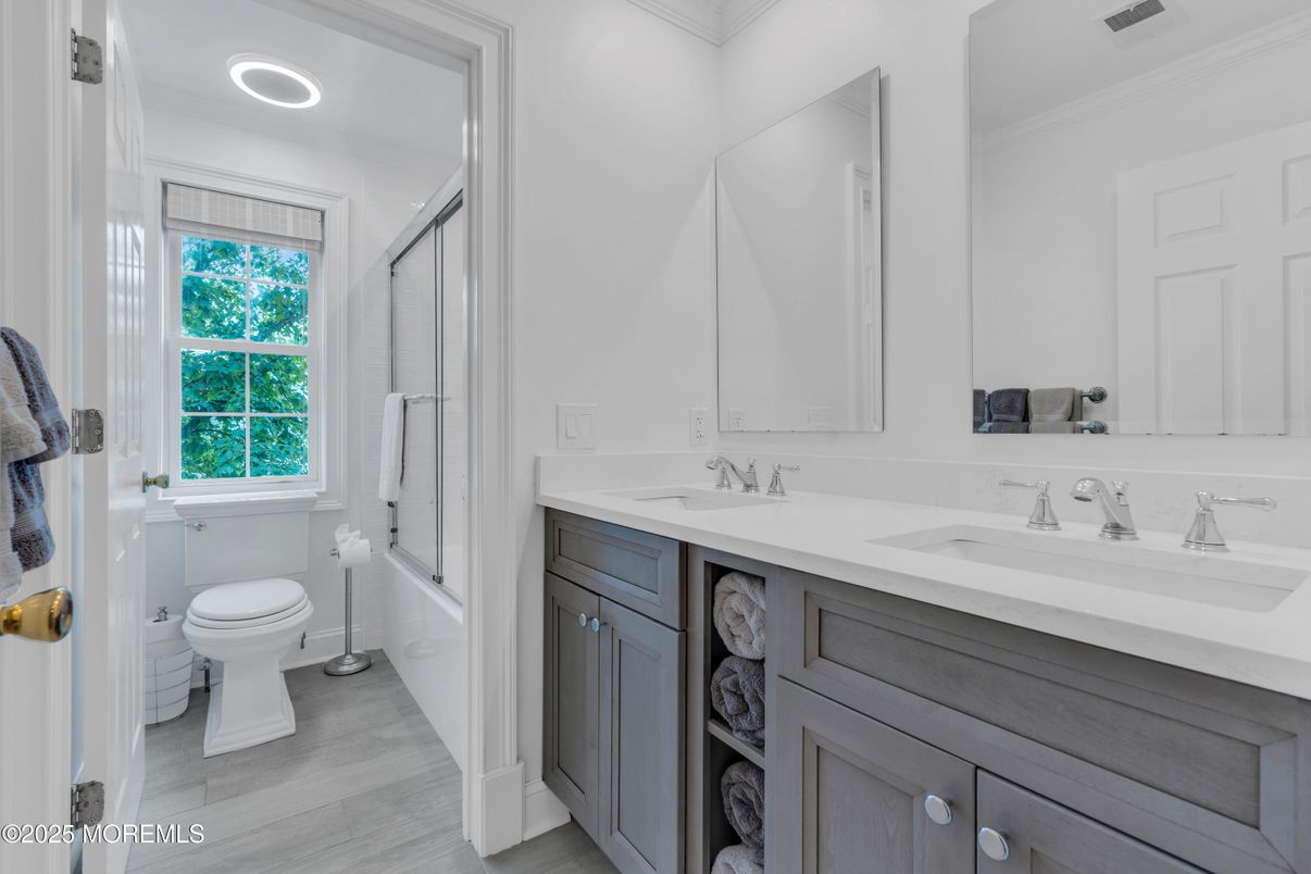 Bathroom, Dual Sink Vanities, Interior, Recessed Lighting, Wood Texture Flooring