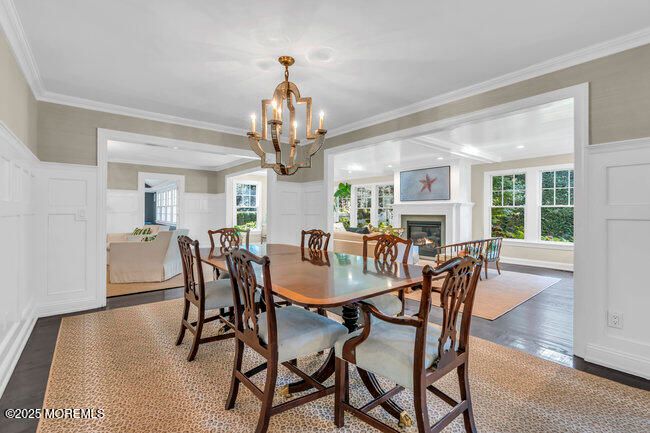 Chandelier, Dining room, Fireplace, Interior, Recessed Lighting, Wood Texture Flooring