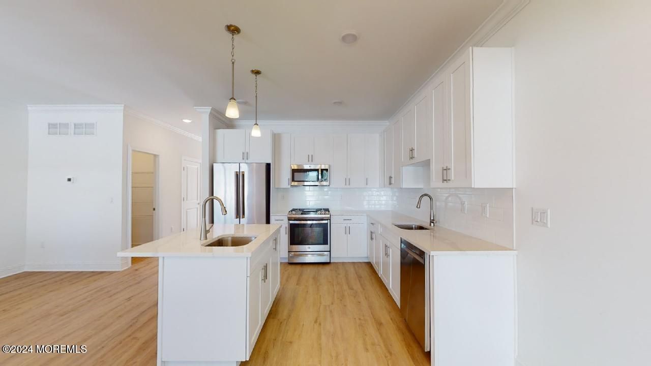 Interior, Kitchen, Pendant Lights, Recessed Lighting, Stainless Steel Appliances, Wood Texture Flooring