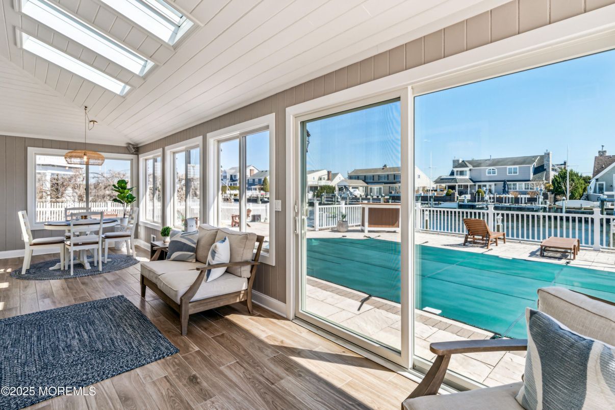 Dining room, Interior, Pendant Lights, Sun Room, Water, Wood Texture Flooring