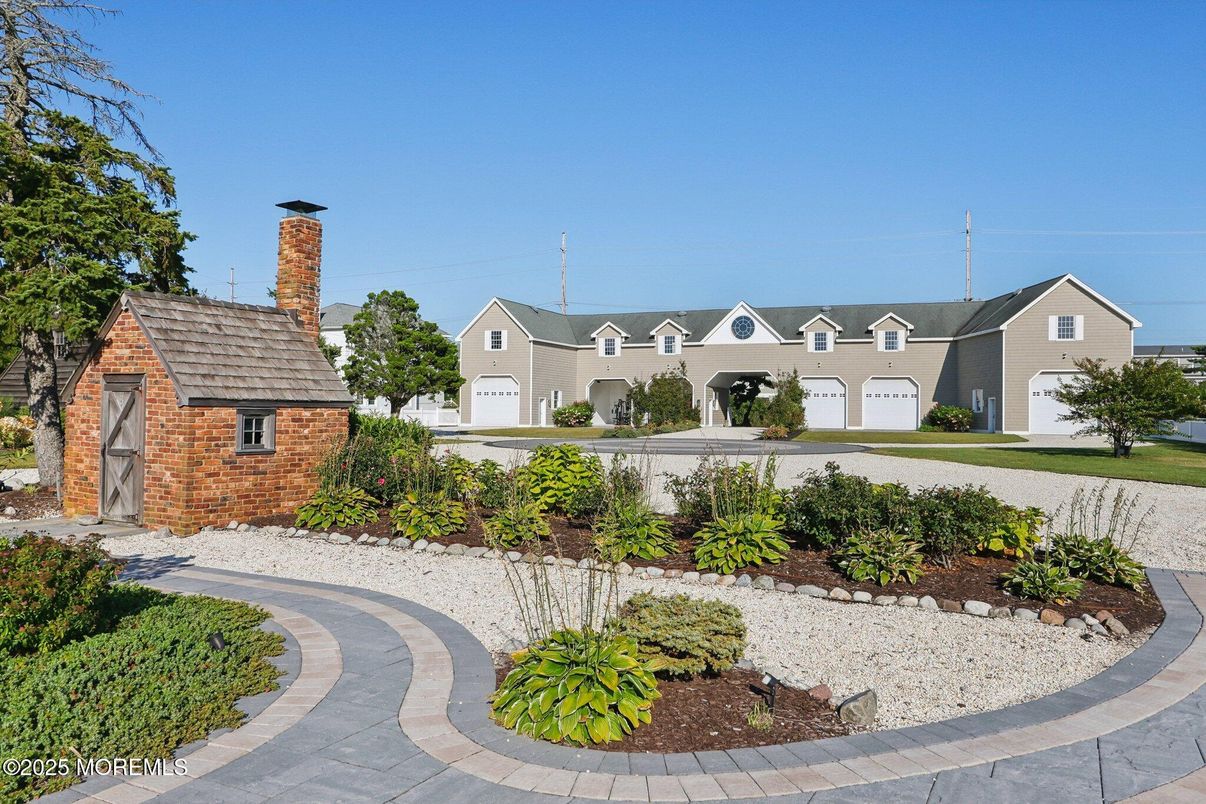 Attached, Backyard, Detached Garage, Exterior, Facade, Brick Facade, French Provincial