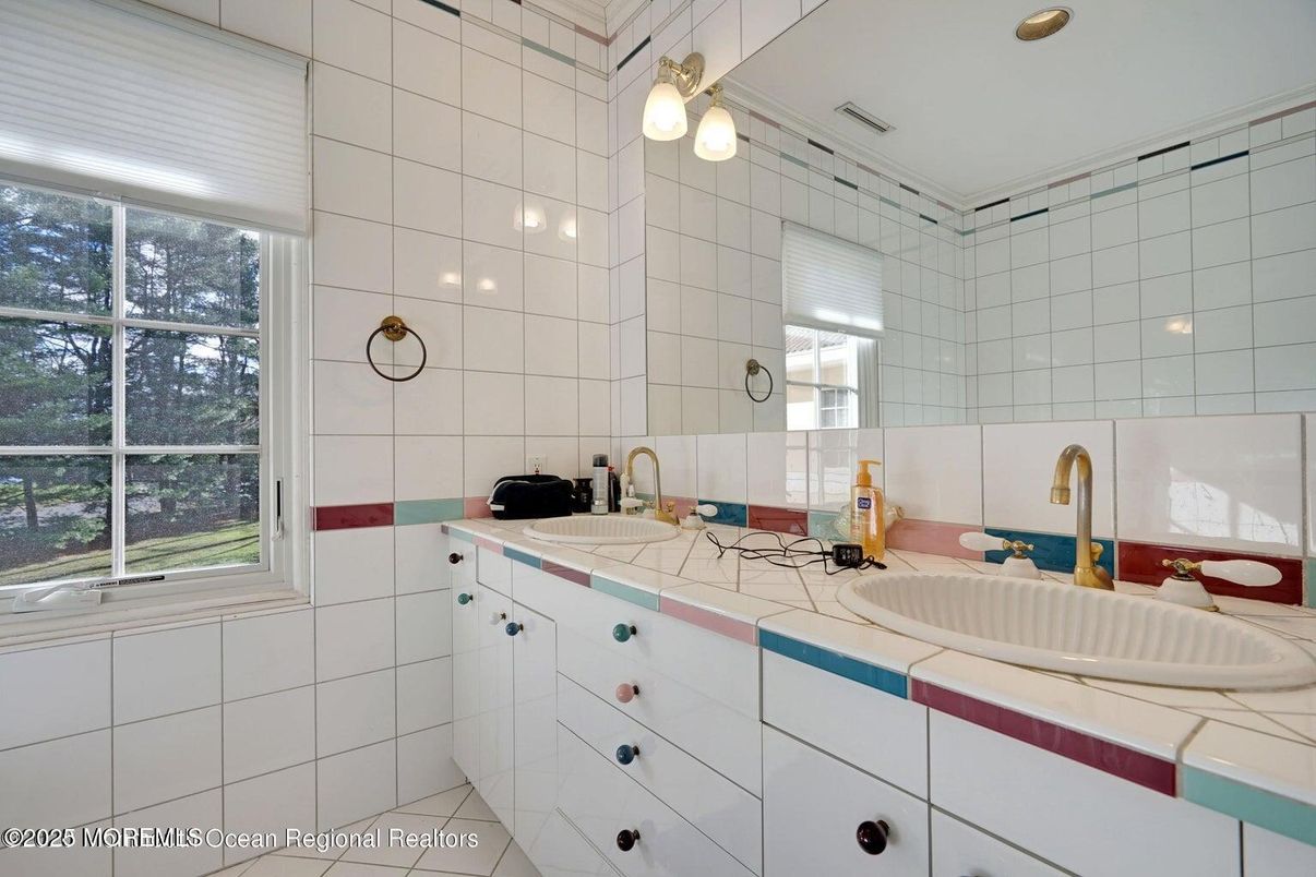 Bathroom, Dual Sink Vanities, Interior, Recessed Lighting, Tile Countertops