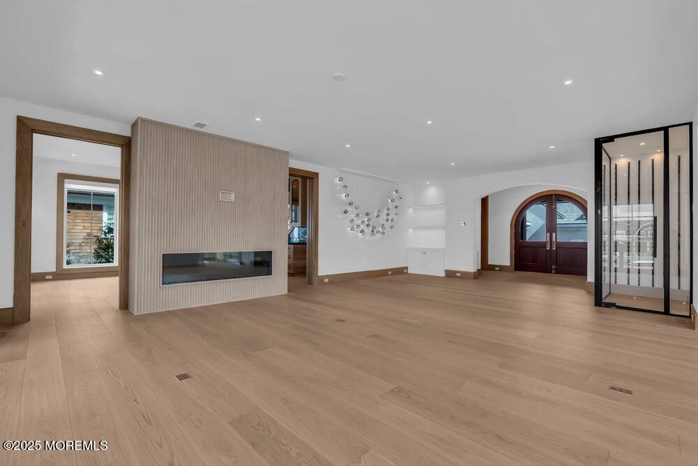 Empty room, Fireplace, Interior, Recessed Lighting, Wood Texture Flooring