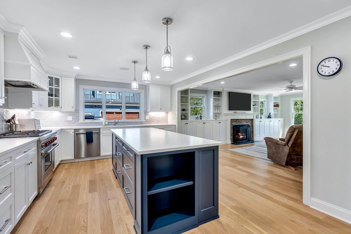 Fireplace, Interior, Kitchen, Living room, Pendant Lights, Recessed Lighting, Stainless Steel Appliances, Wood Texture Flooring