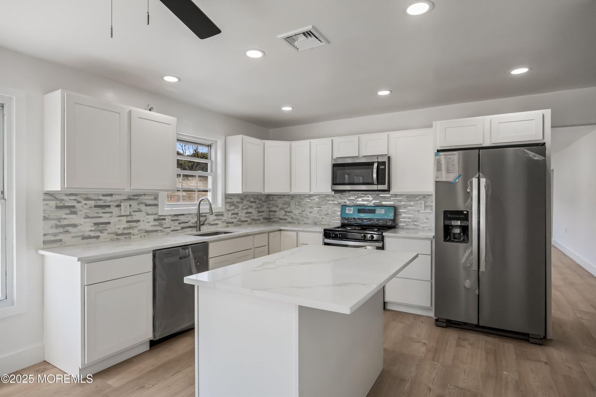 Interior, Kitchen, Recessed Lighting, Stainless Steel Appliances, Wood Texture Flooring