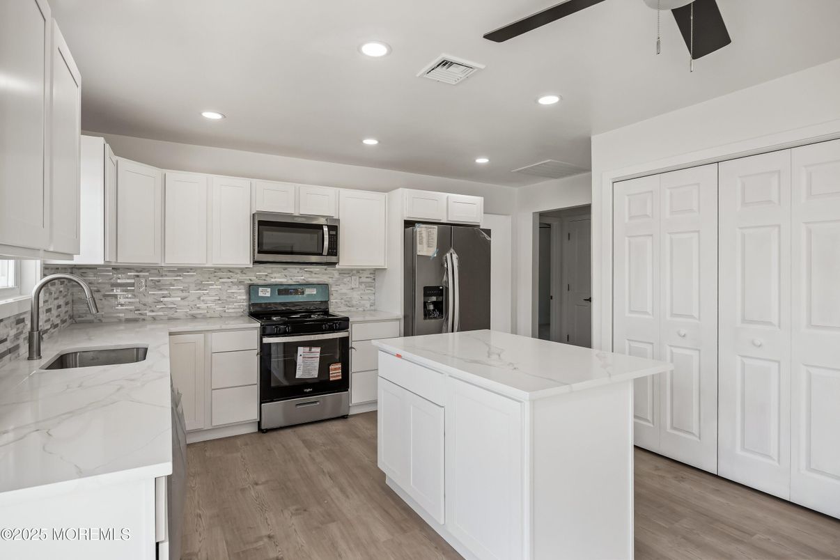Interior, Kitchen, Recessed Lighting, Stainless Steel Appliances, Wood Texture Flooring