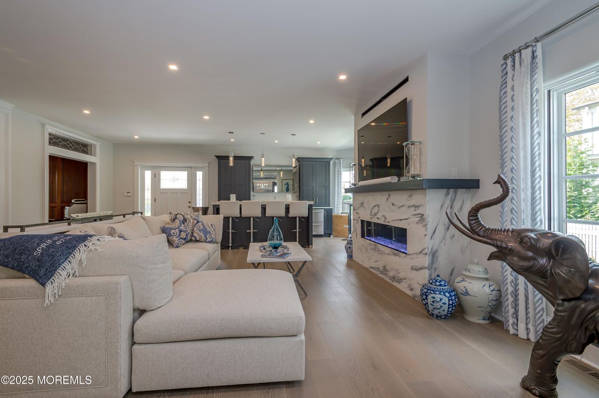 Fireplace, Interior, Kitchen, Living room, Recessed Lighting, Wood Texture Flooring