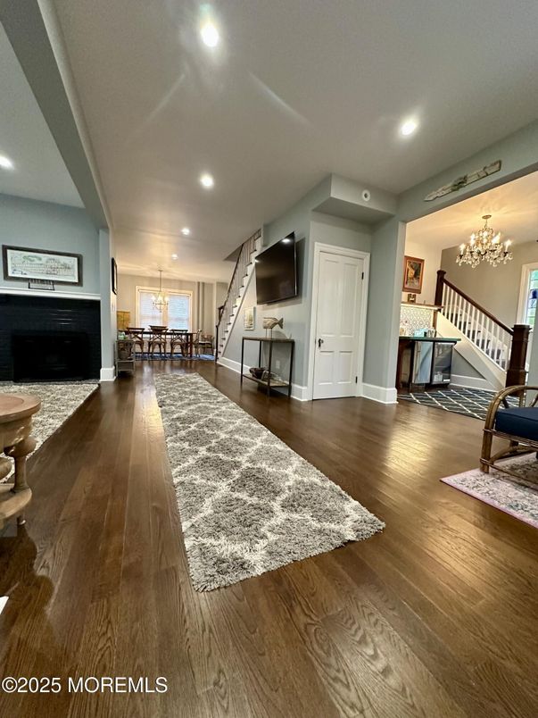 Chandelier, Dining room, Fireplace, Interior, Recessed Lighting, Wood Texture Flooring