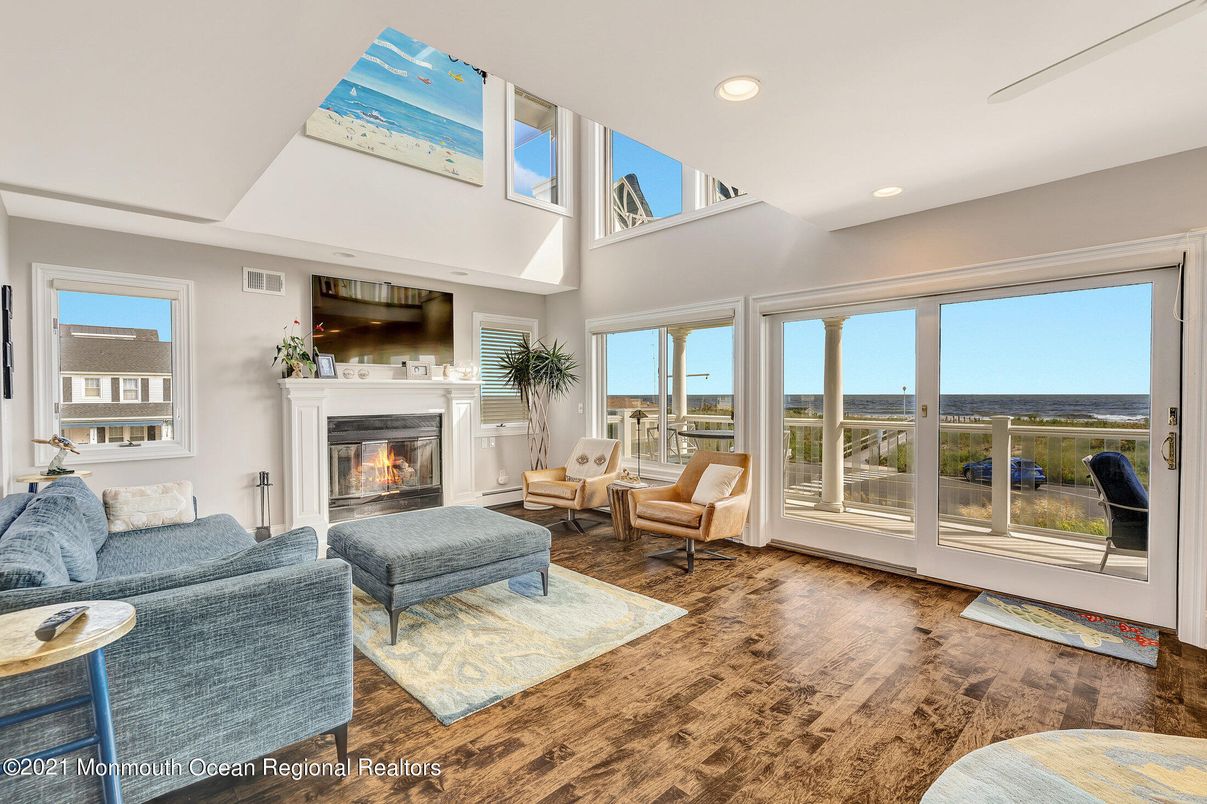 Fireplace, Interior, Living room, Recessed Lighting, Water, Wood Texture Flooring