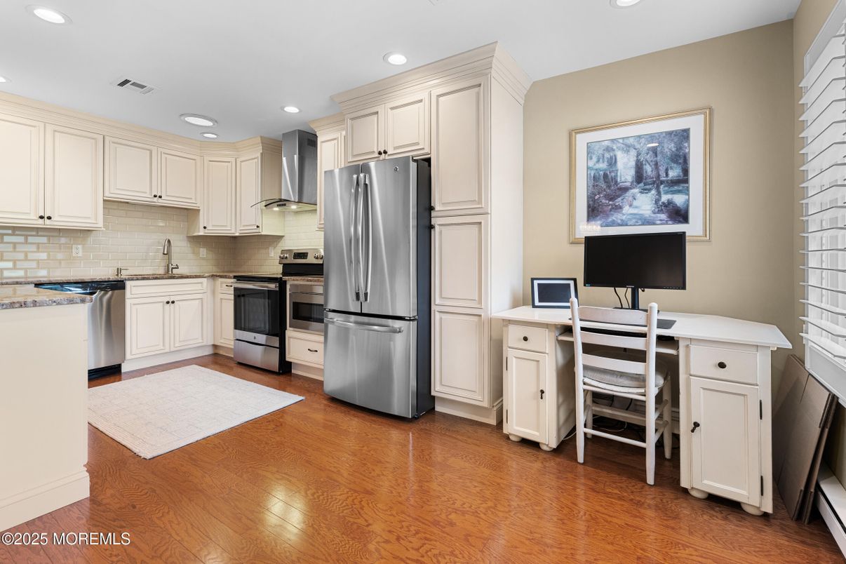 Dining room, Interior, Kitchen, Recessed Lighting, Stainless Steel Appliances, Wood Texture Flooring