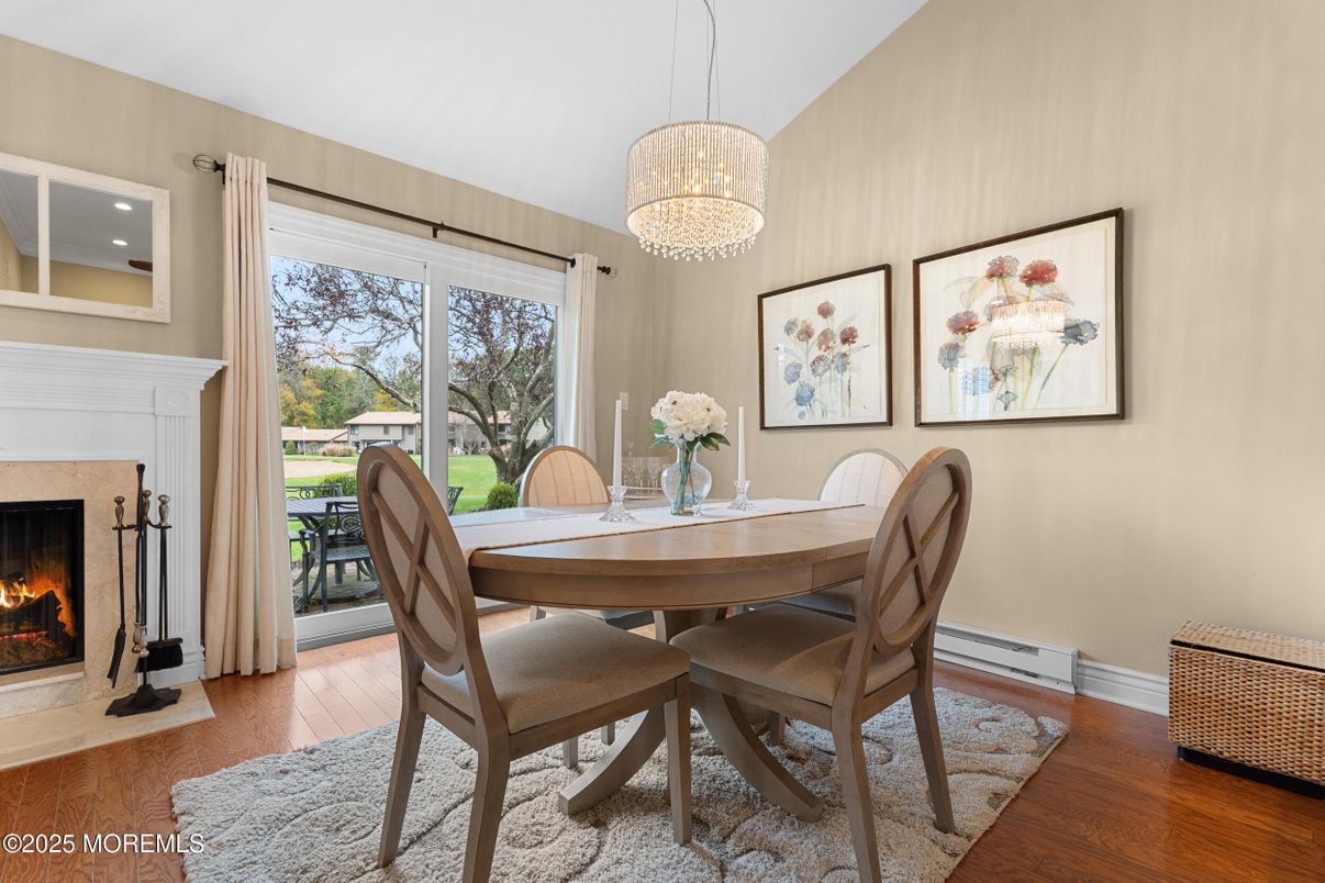 Chandelier, Dining room, Fireplace, Interior, Pendant Lights, Recessed Lighting, Wood Texture Flooring