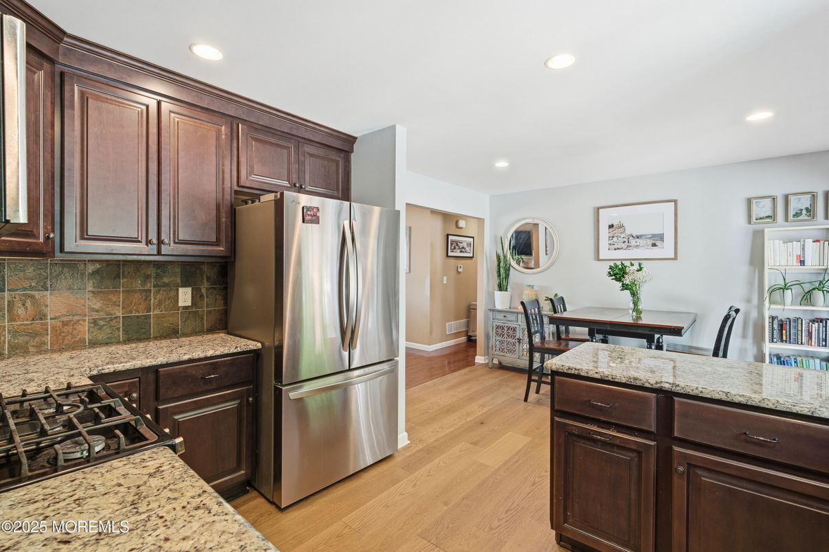 Dining room, Interior, Kitchen, Recessed Lighting, Stainless Steel Appliances, Wood Texture Flooring