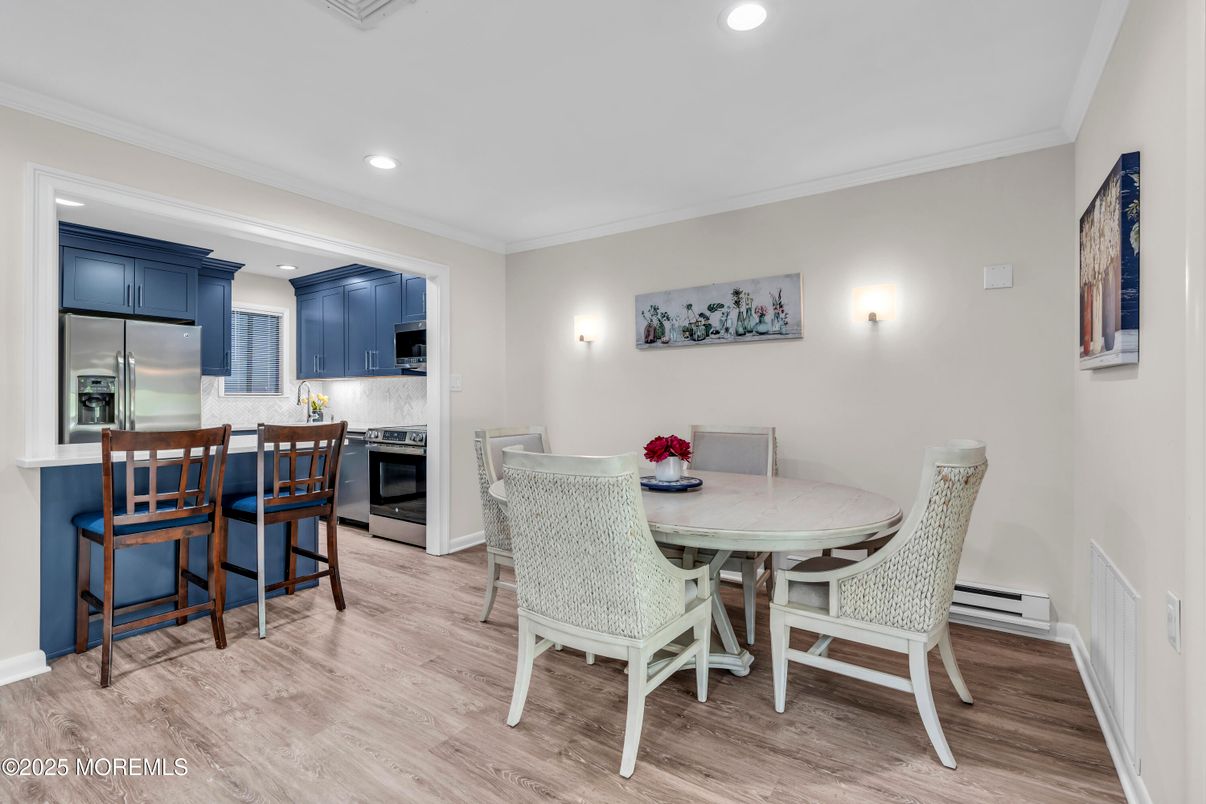 Dining room, Interior, Kitchen, Recessed Lighting, Stainless Steel Appliances, Wood Texture Flooring