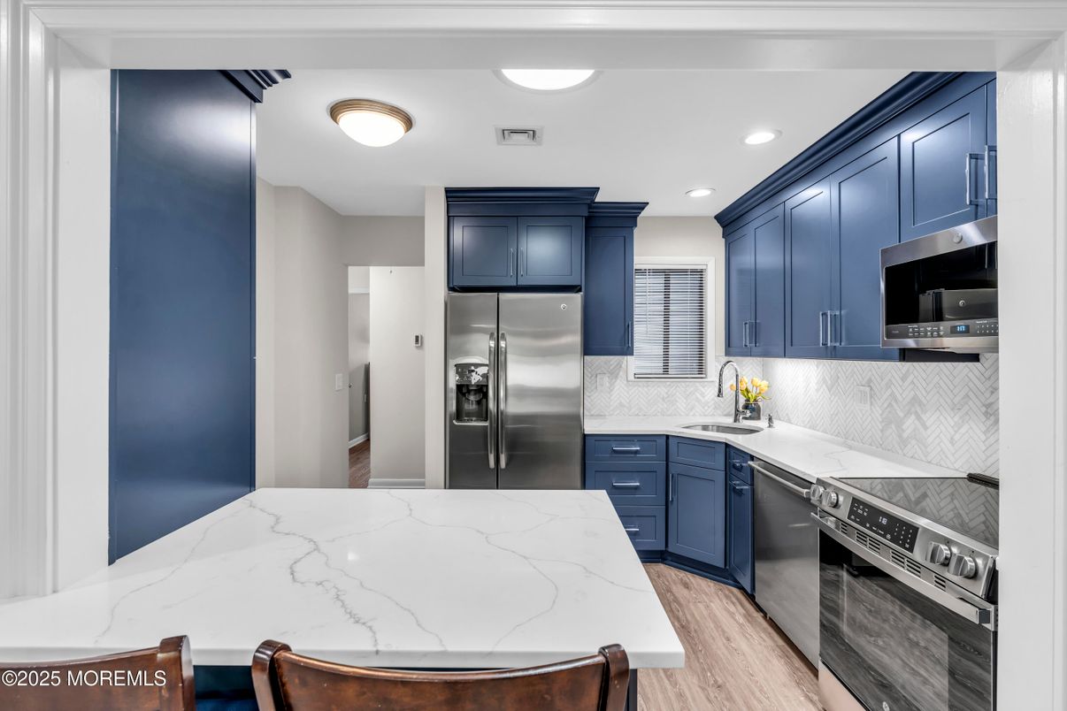 Interior, Kitchen, Recessed Lighting, Stainless Steel Appliances, Wood Texture Flooring