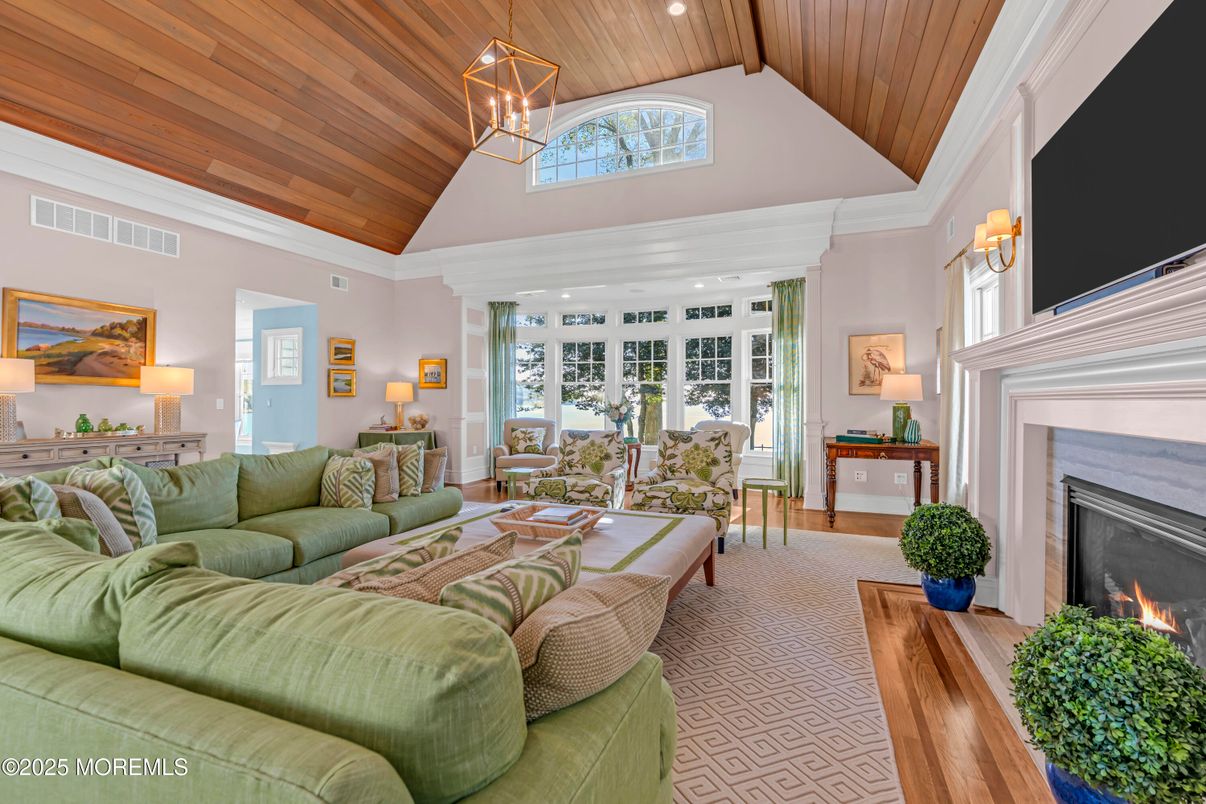 Fireplace, Interior, Living room, Pendant Lights, Recessed Lighting, Wooden Ceilings, Wood Texture Flooring