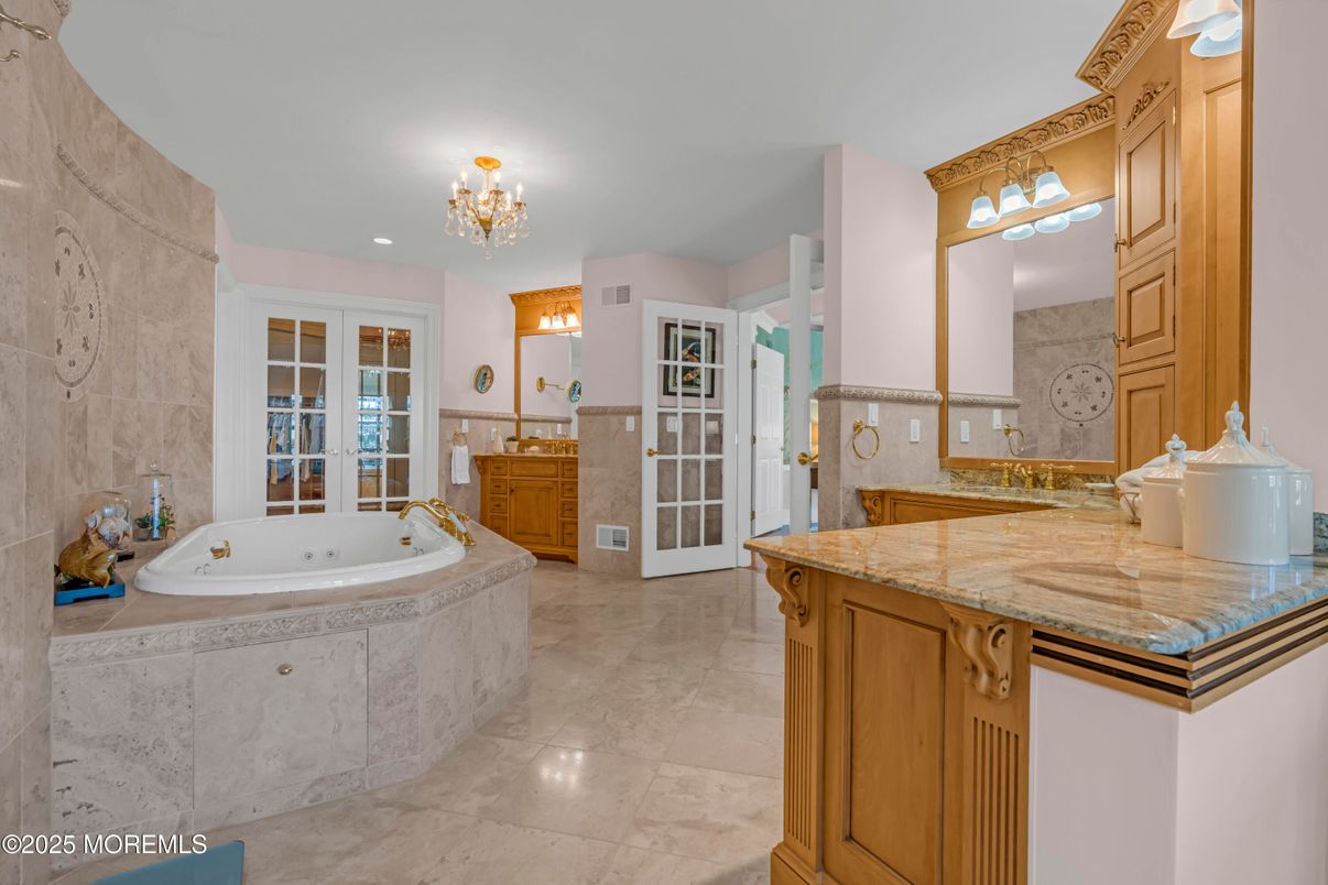 Bathroom, Chandelier, Dual Sink Vanities, Interior, Recessed Lighting