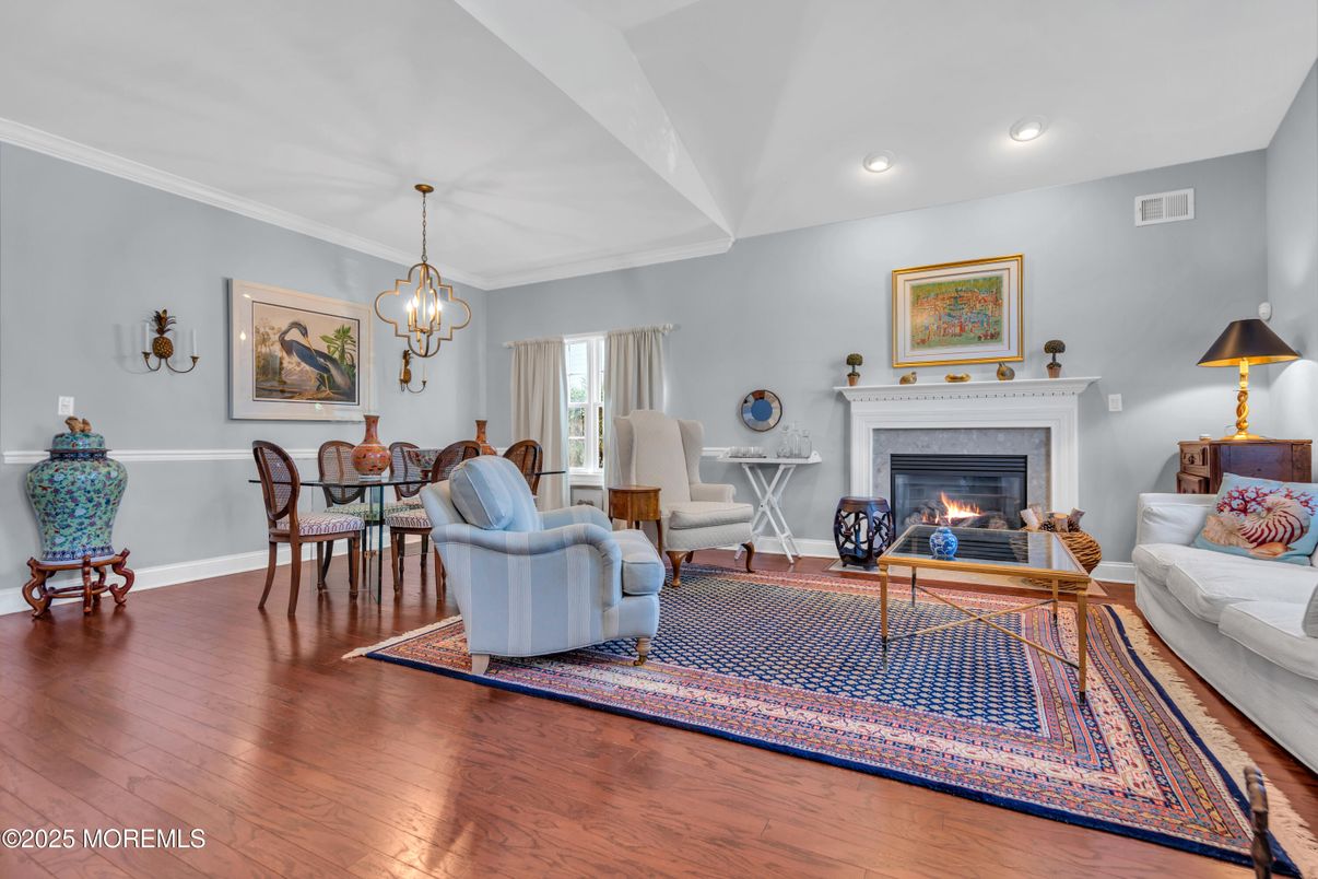 Dining room, Fireplace, Interior, Living room, Pendant Lights, Recessed Lighting, Wood Texture Flooring