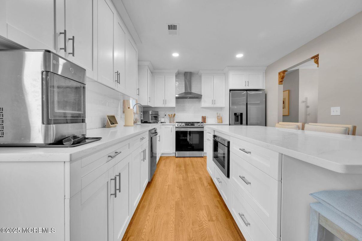 Interior, Kitchen, Recessed Lighting, Stainless Steel Appliances, Wood Texture Flooring