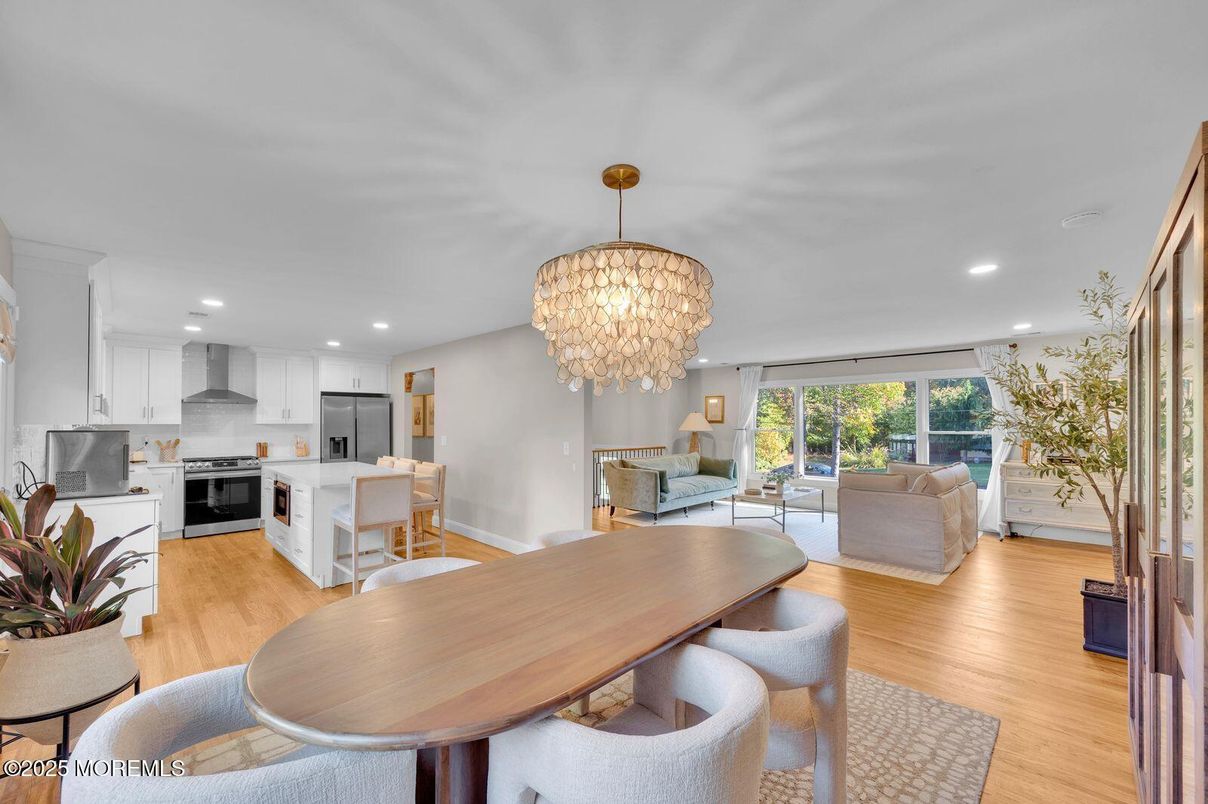 Chandelier, Dining room, Interior, Kitchen, Living room, Recessed Lighting, Stainless Steel Appliances, Wood Texture Flooring