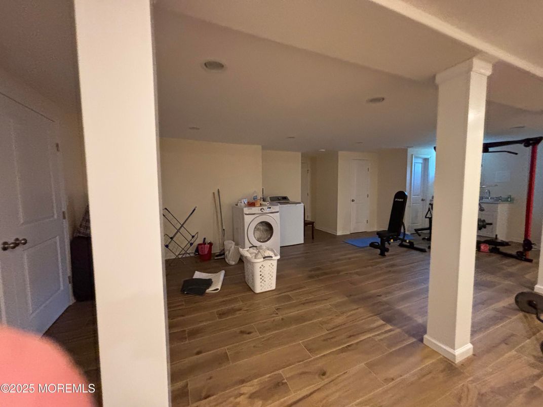 Fitness Equipment, Interior, Recessed Lighting, Washer, Wood Texture Flooring