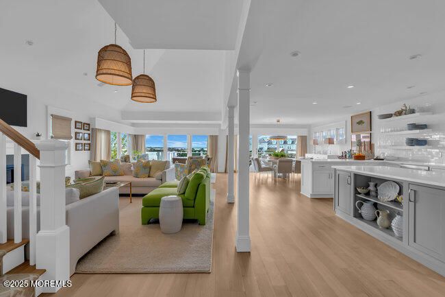 Dining room, Interior, Kitchen, Living room, Pendant Lights, Recessed Lighting, Water, Wood Texture Flooring