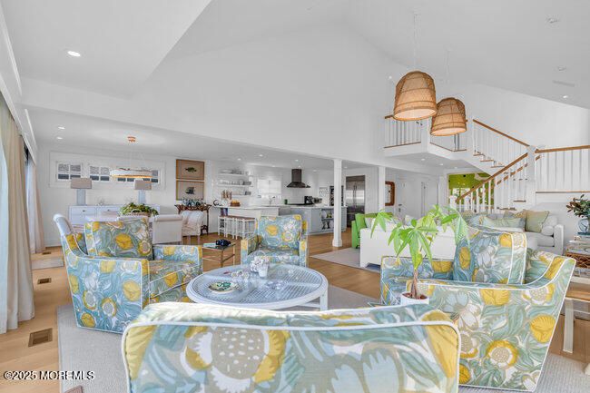 Dining room, Interior, Kitchen, Living room, Pendant Lights, Recessed Lighting, Stainless Steel Appliances, Wood Texture Flooring