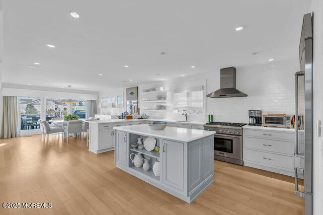 Dining room, Interior, Kitchen, Recessed Lighting, Stainless Steel Appliances, Wood Texture Flooring