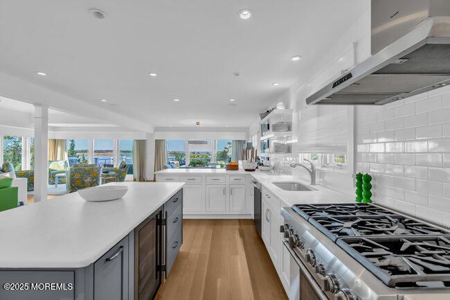 Interior, Kitchen, Recessed Lighting, Stainless Steel Appliances, Water, Wood Texture Flooring